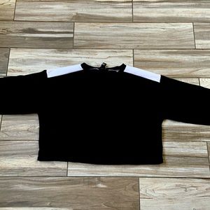 I’m selling a very comfortable black and white sweater from forever 21